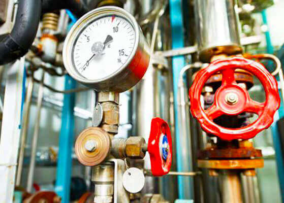 Close up view of equipment valves and gauges