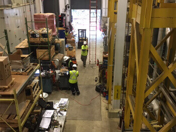 View of workers in a warehouse facility